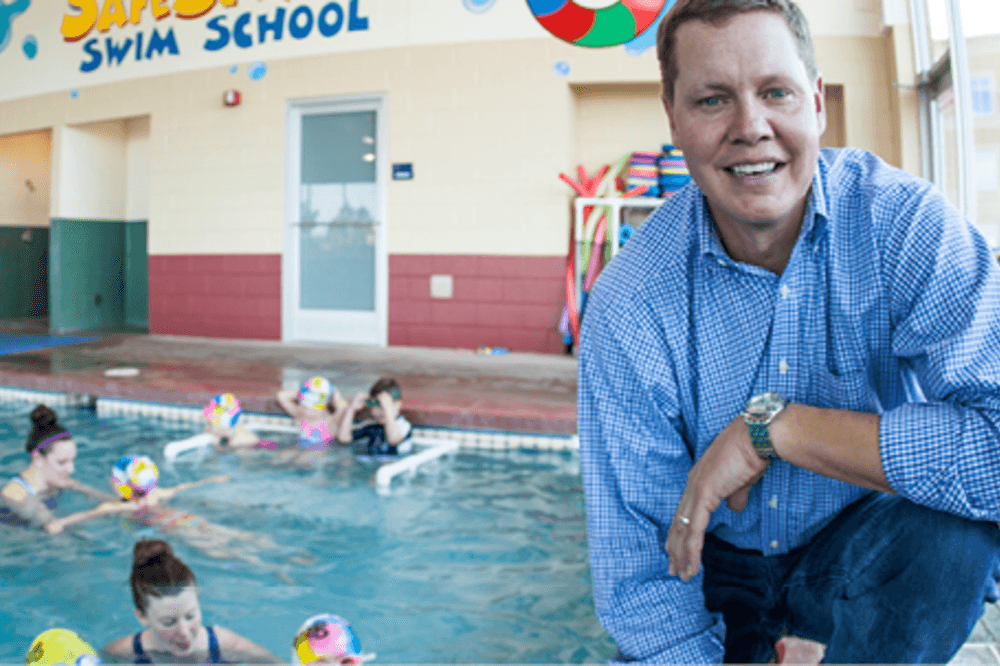 matt-lane-large-posing-by-indoor-pool